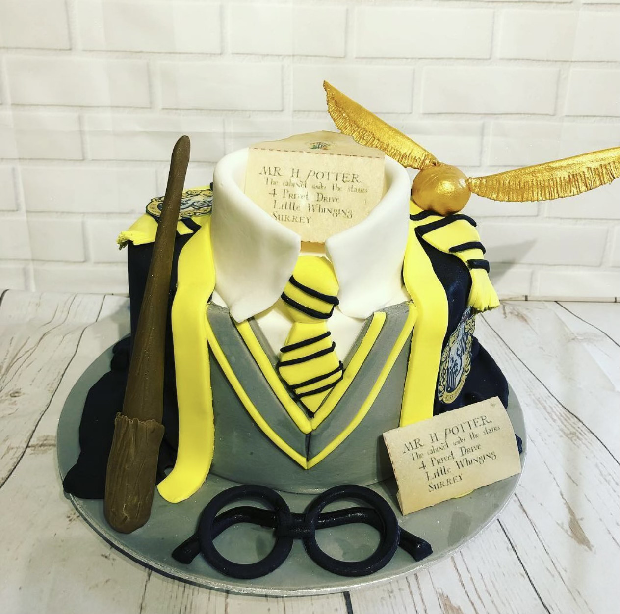 A wedding cake with blackberries and nature