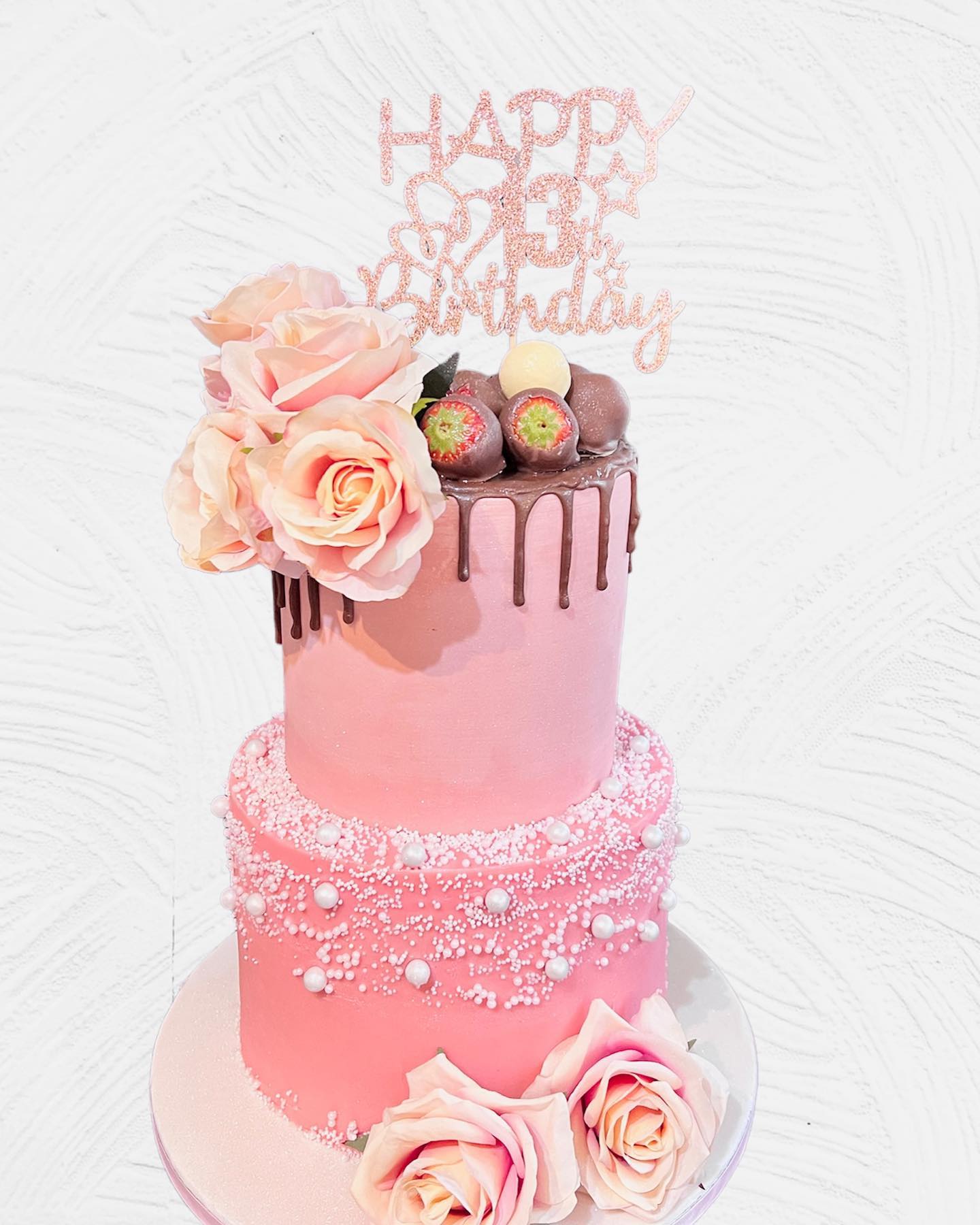 A floral wedding cake at Old Thorns Hotel and Spa